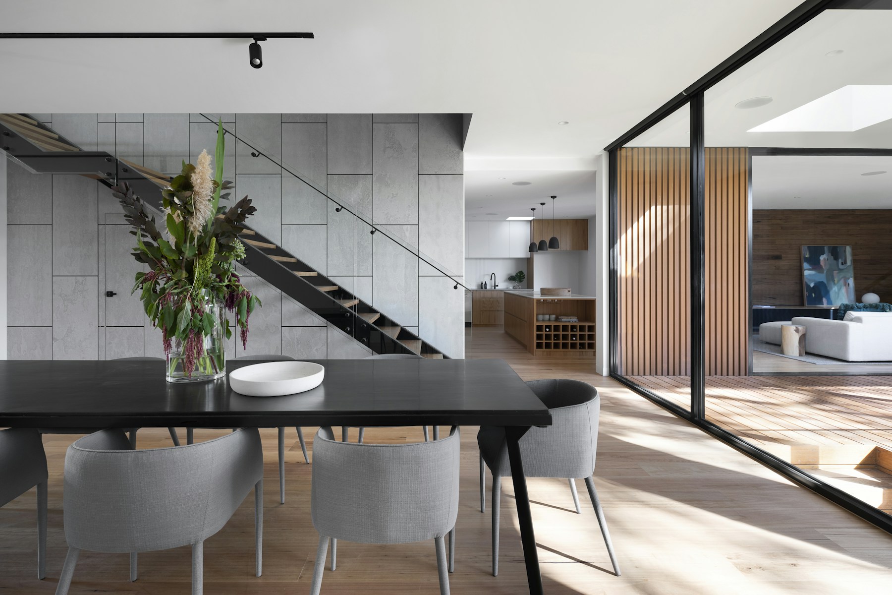 Bright coastal contemporary interior with professionally installed wallpaper